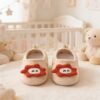 Off-white smiley face baby shoes